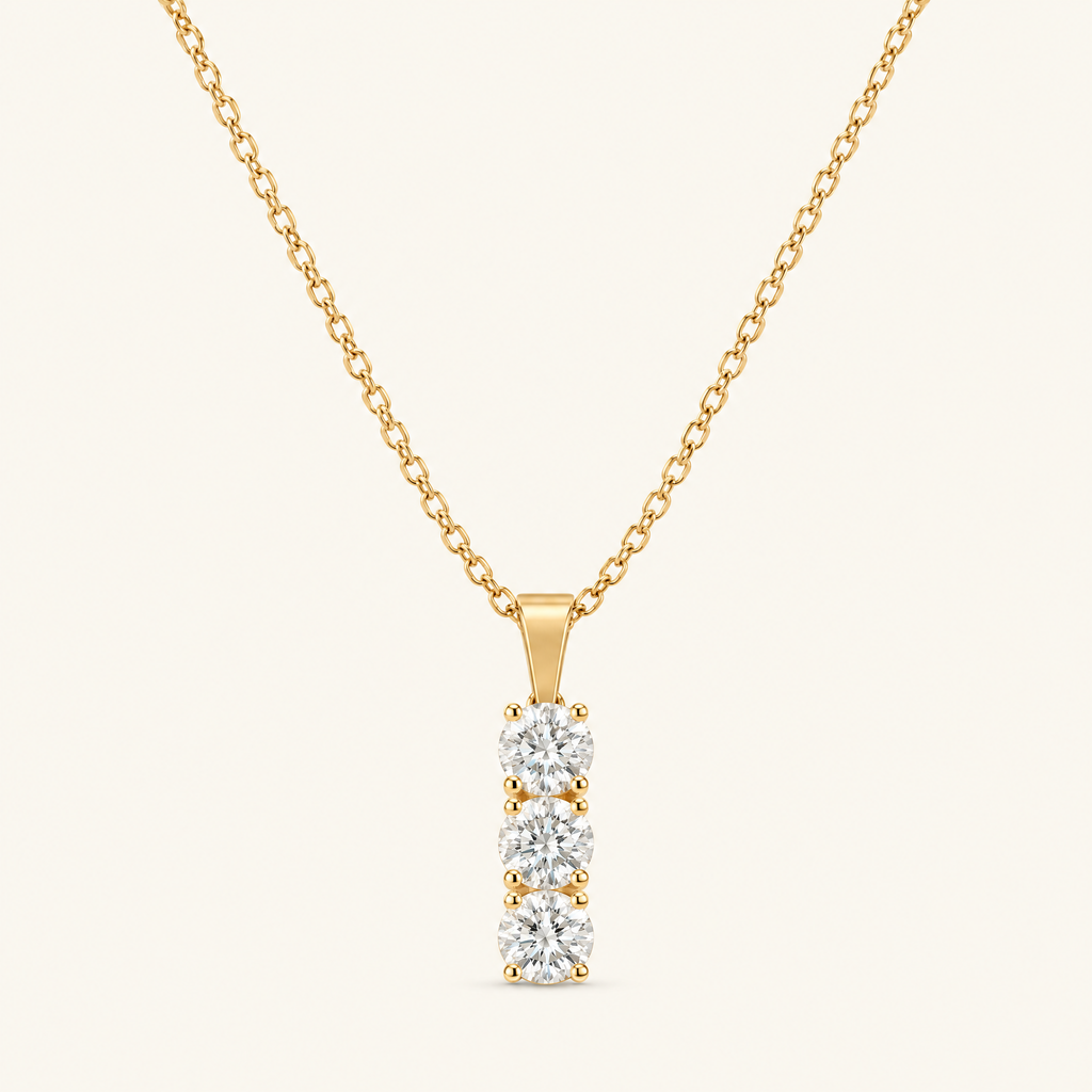 Cascade gold three-stone drop necklace