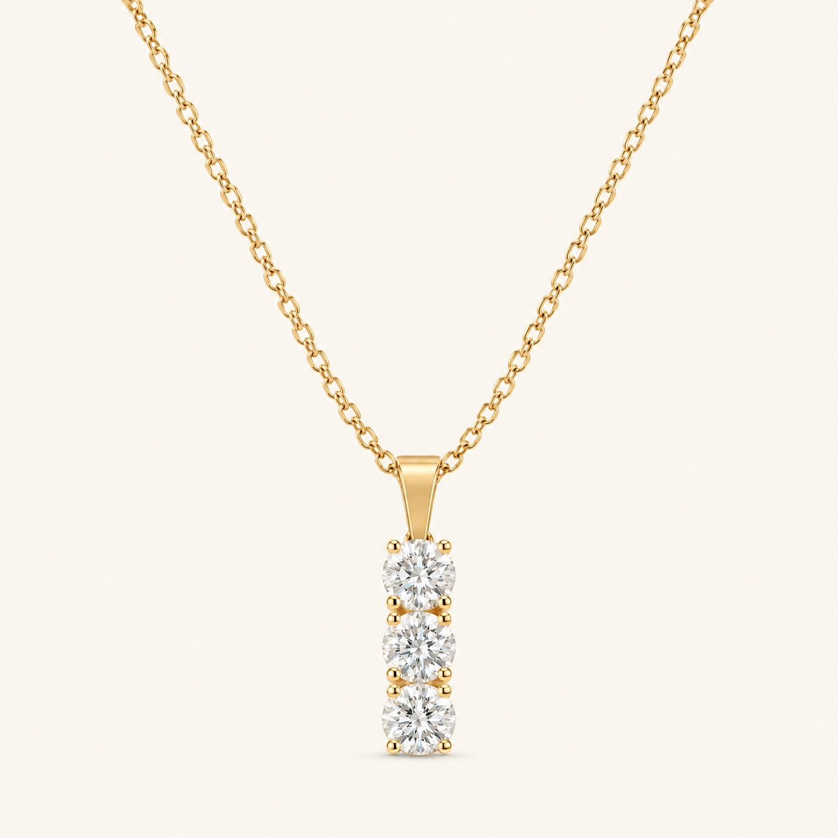 Cascade gold three-stone drop necklace