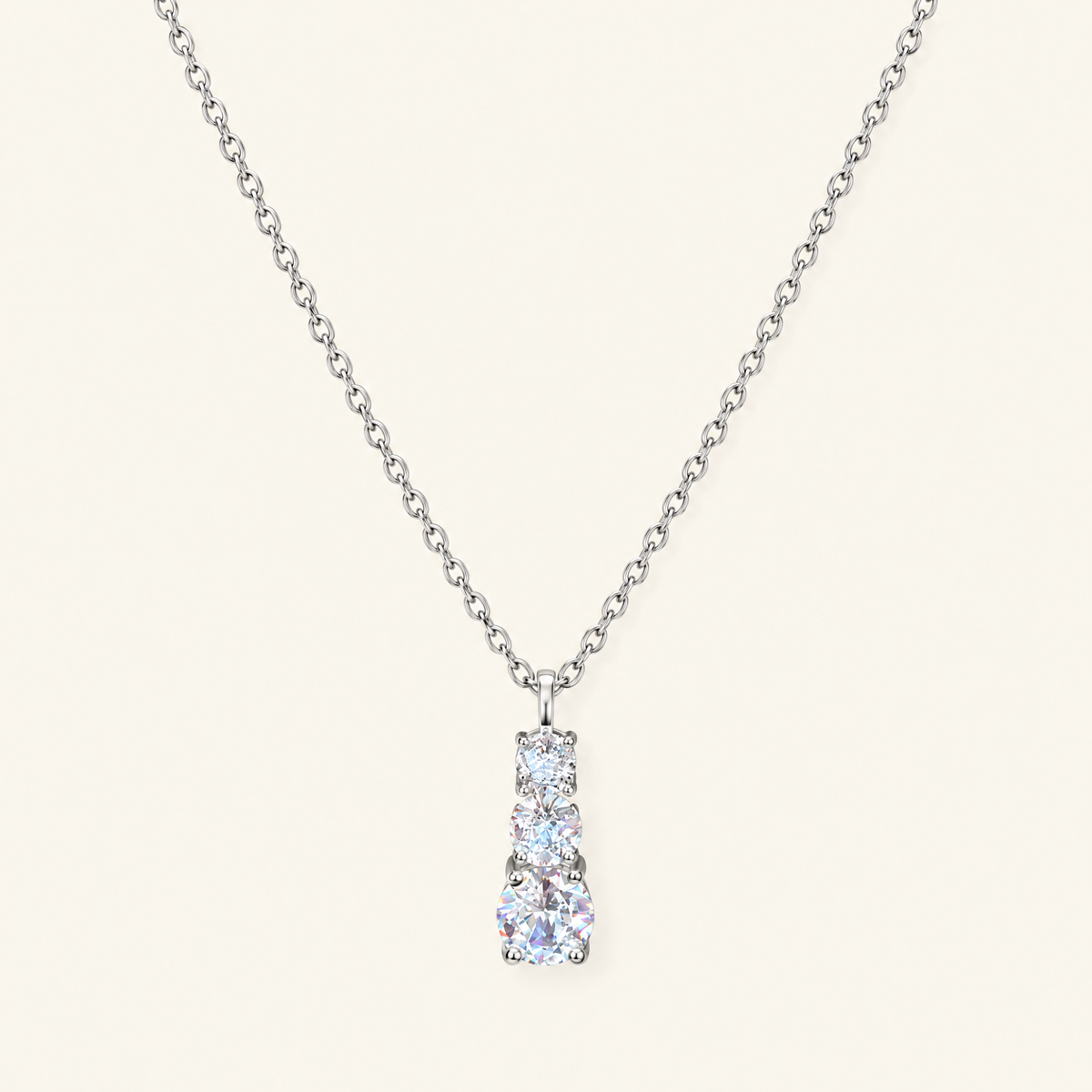 Silver three-stone zircon drop necklace